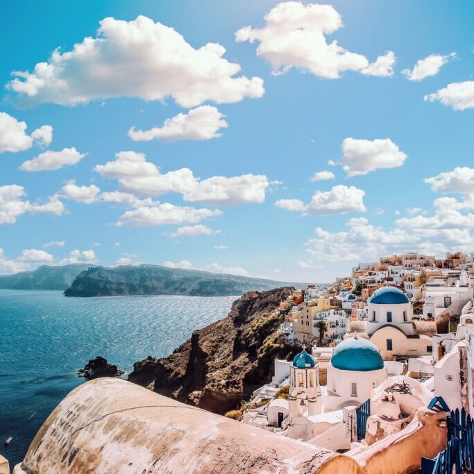 Photo by Aleksandar Pasaric: https://www.pexels.com/photo/white-concrete-house-near-body-of-water-under-white-and-blue-cloudy-sky-1285625/